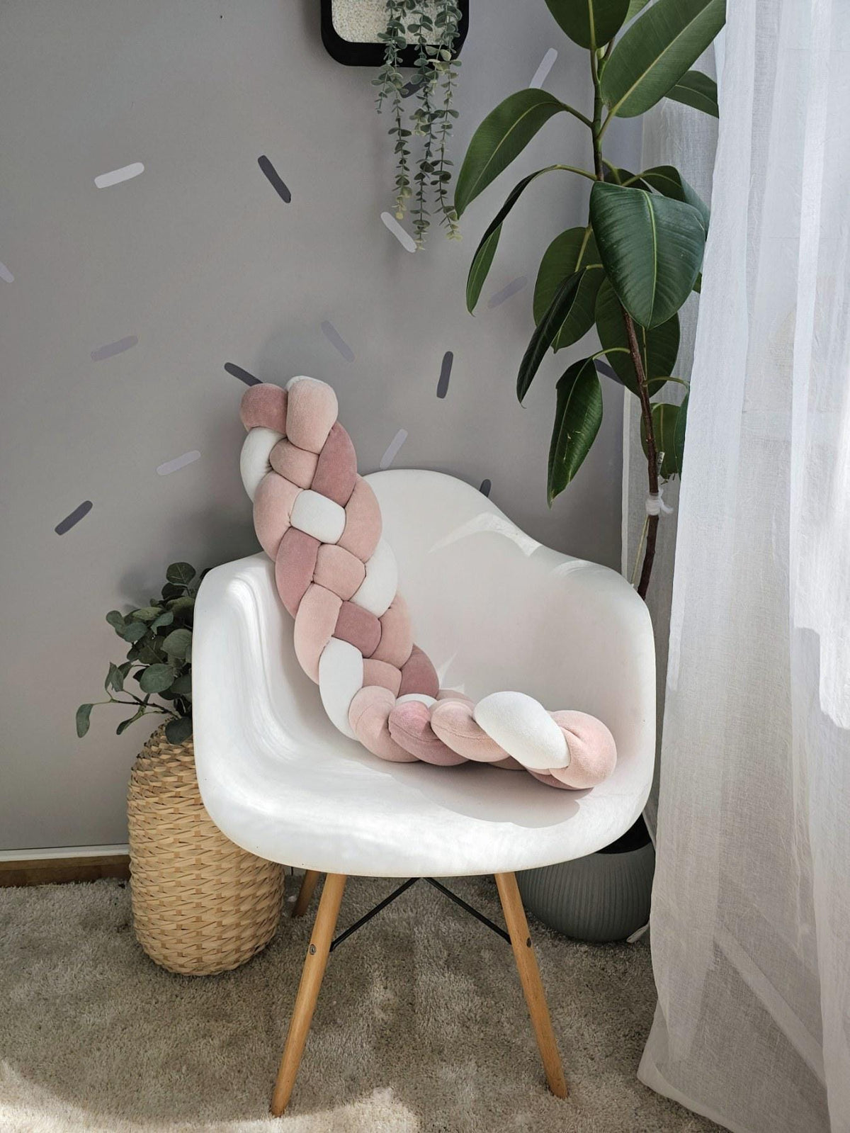 Braid pillow for door or window draft barrier. Knot pillow
