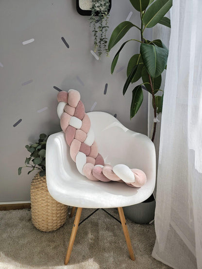 Braid pillow for door or window draft barrier. Knot pillow