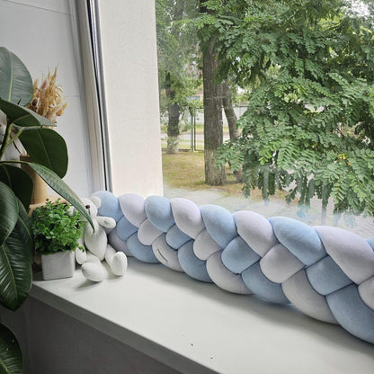 Braid pillow for door or window draft barrier. Knot pillow